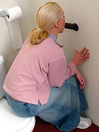 Find-Best-Mature.com presents: Blonde girl Jamie sits on the toilet and blows a black gloryhole dong